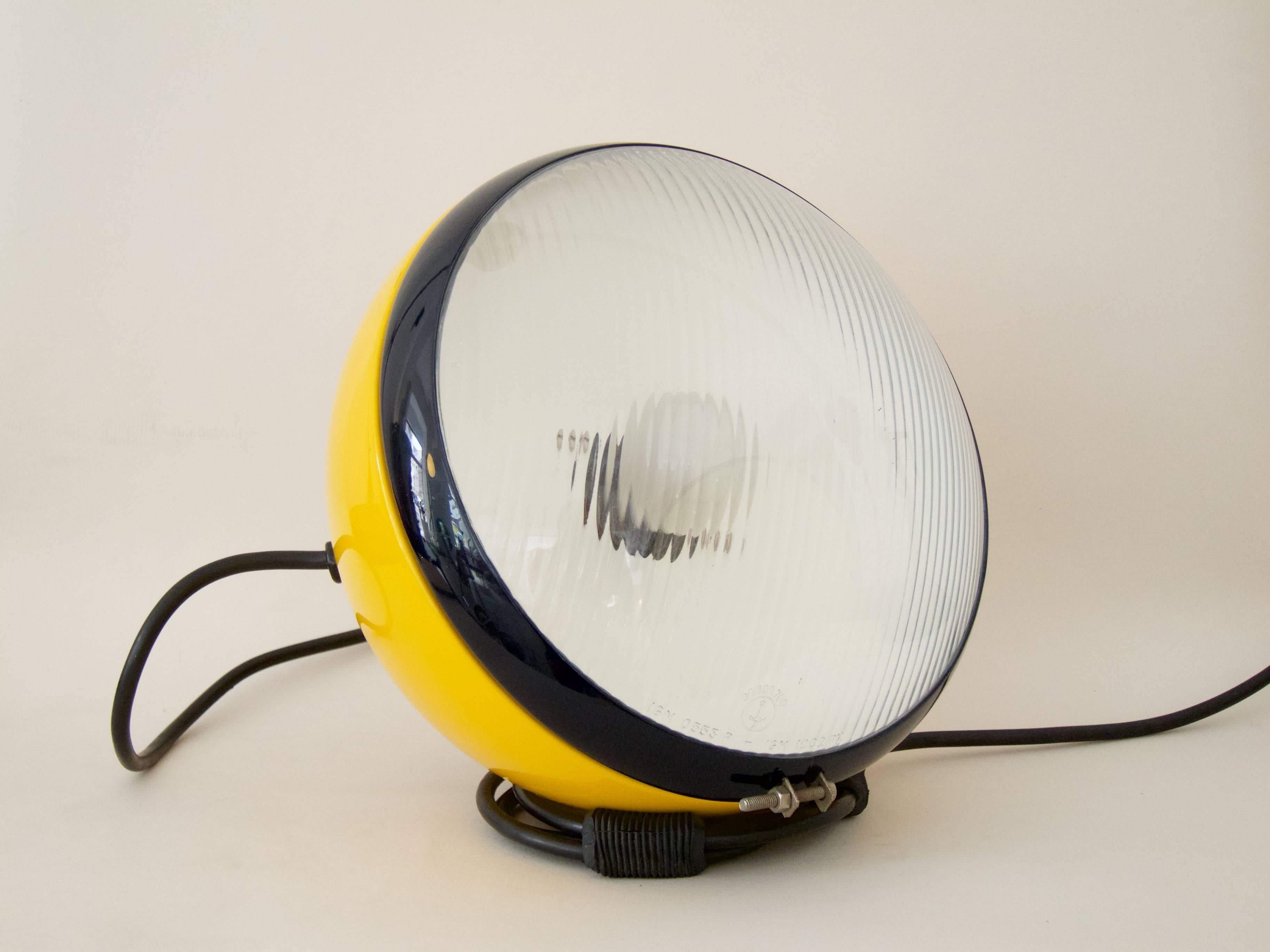 A very rare light object "Bowling" designed 1968 by Cesare Leonardi and Franca Stagi for Lumenform.

The design of the lamp was inspired by the headlight of the Fiat 666.
yellow aluminum case,
the coiled cable act as the base for the