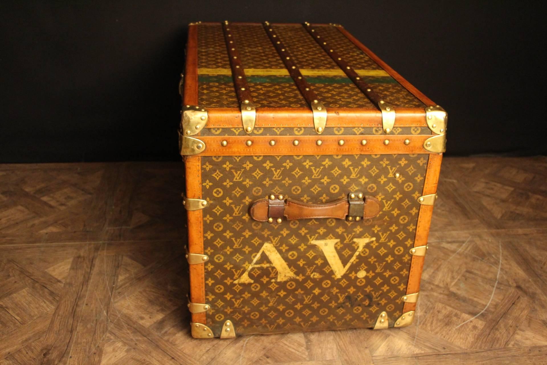 This beautiful Louis Vuitton courier steamer trunk features stenciled monogram canvas, lozine trim, brass locks and corners as well as leather handles. All stamped LV brass studs.
It has got a beautiful warm patina.
As to its interiors, it is all