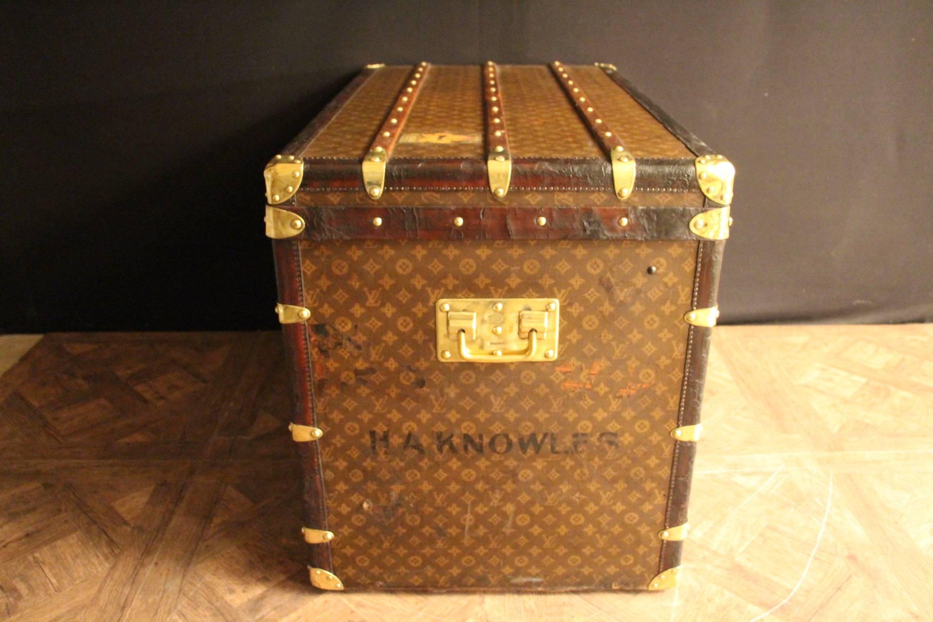 Extra large Louis Vuitton steamer trunk featuring monogram canvas, leather trim, stamped LV brass locks, stamped LV brass locks, brass corners and stamped LV studs. It has got a beautiful and warm patina.
Original interior with its serial number