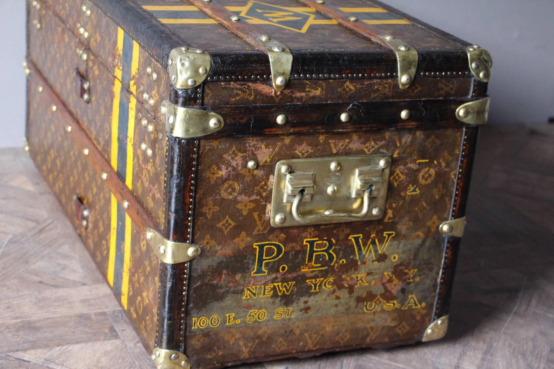 This small Louis Vuitton trunk features monogram canvas, leather trim, brass corners and all LV stamped brass studs, locks and side handles.
Beautiful patina and very charming and unusual proportions.
Its interior is all original too in red and