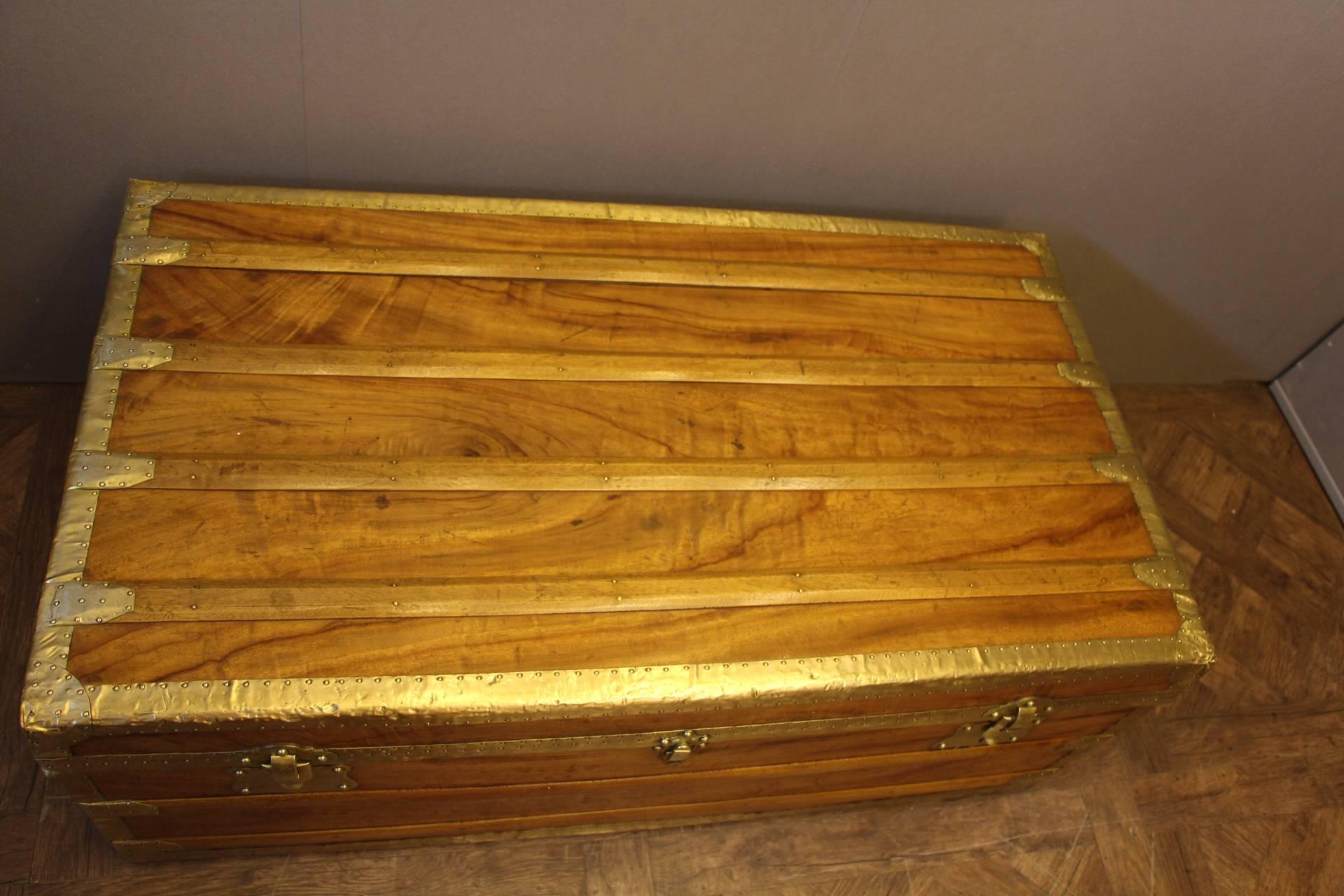 It is a very unusual camphor wood trunk with brass trim, locks and side handles. It has a very warm patina. It is top quality and very chic.
Its interior is perfectly clean and can be used for storage.
Obviously, the smell of camphor is still very