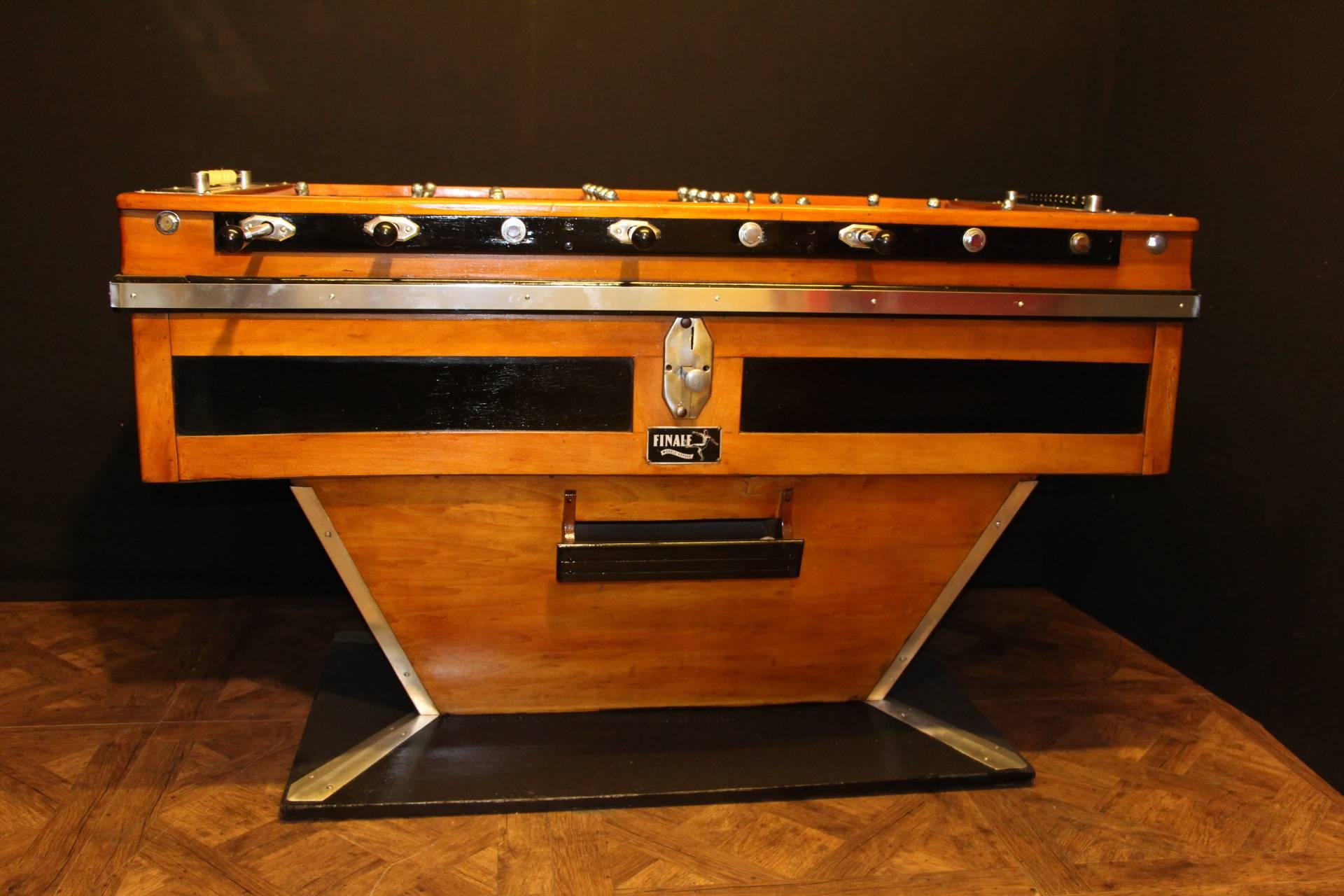 This magnificent French beechwood and ebonized table on shaped supports has got black and silver steel players and polished aluminum fittings. It is a beautiful decorative piece as well as a fabulous game table in working order.
Originally, it was