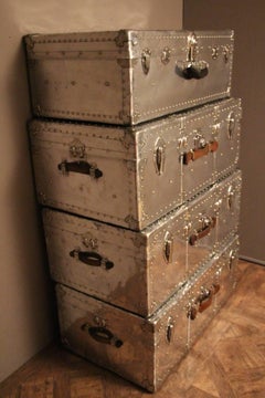 Stack of Four Polished Aluminum Steamer Trunks