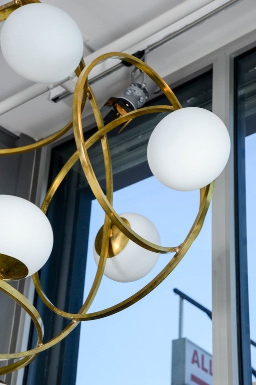 Impressive Multi Hoops Brass and Glass Chandelier at 1stDibs