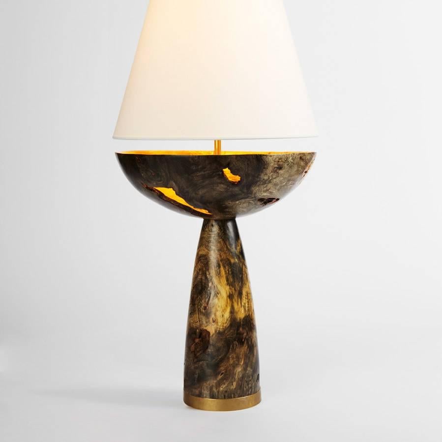 The Cenotaph lamp collection is based on a foreign man, his daughter, three horses, a mare, a gelding, and a horse of both sexes. In the dream sequence, the man offers Barron a delicately spun gold card to call upon him to meet his daughter and the
