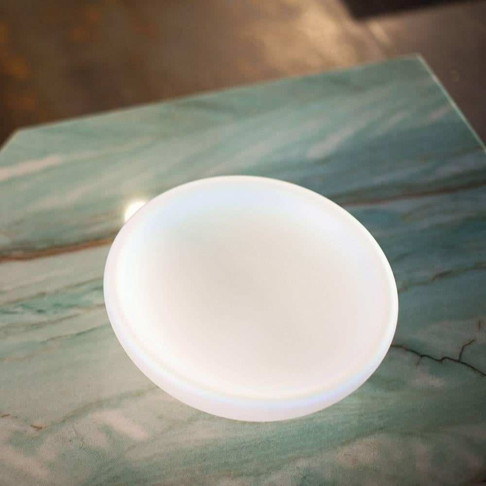 The bowl design was a 'happy accident' when artist Katherine Gray was experimenting with iridescent surfaces. Inspired by James Turrell's 