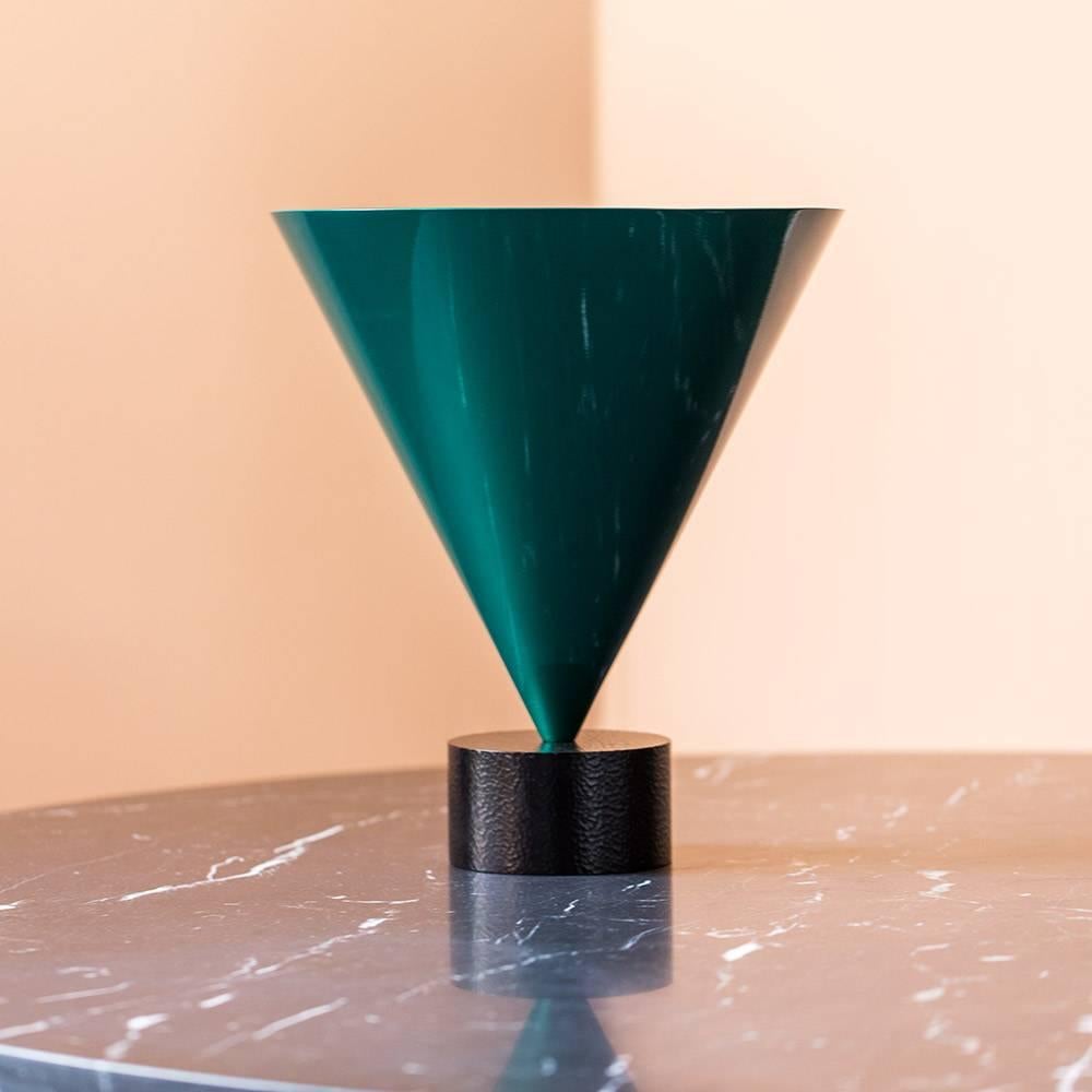 With its hammered black painted metal base and painted metal void, Trophe is a striking vase which intends to evokes the shadow of a fresh bouquet of flowers.

Pool is a French duo composed of Le´a Padovani and Se´bastien Kieffer based in Paris.
