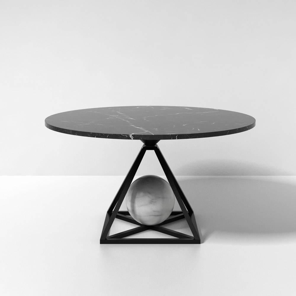 The new contrepoids marble table, part of a limited edition collection, is a combination of the traditional Craft of hammered metal and contemporary design. These tables refer to the tradition of French decorative arts, twisted with an Industrial