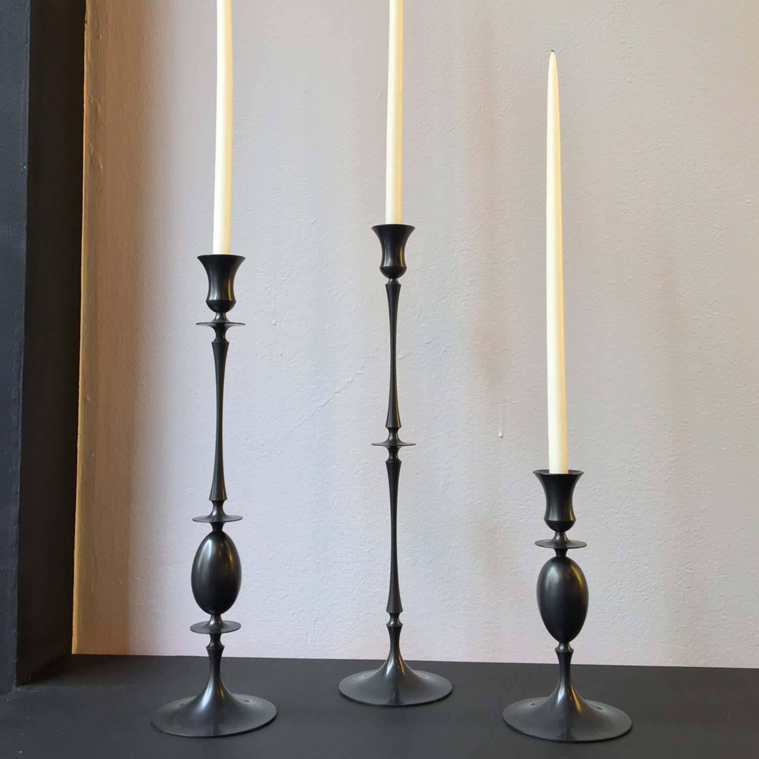 Inspired by the precision of nineteenth-century lathe work, Ted Muehling based these candlesticks on three basic shapes: the egg, an attenuated rod, and a trumpet form. By combining and varying these, Muehling has created 17 different candlesticks