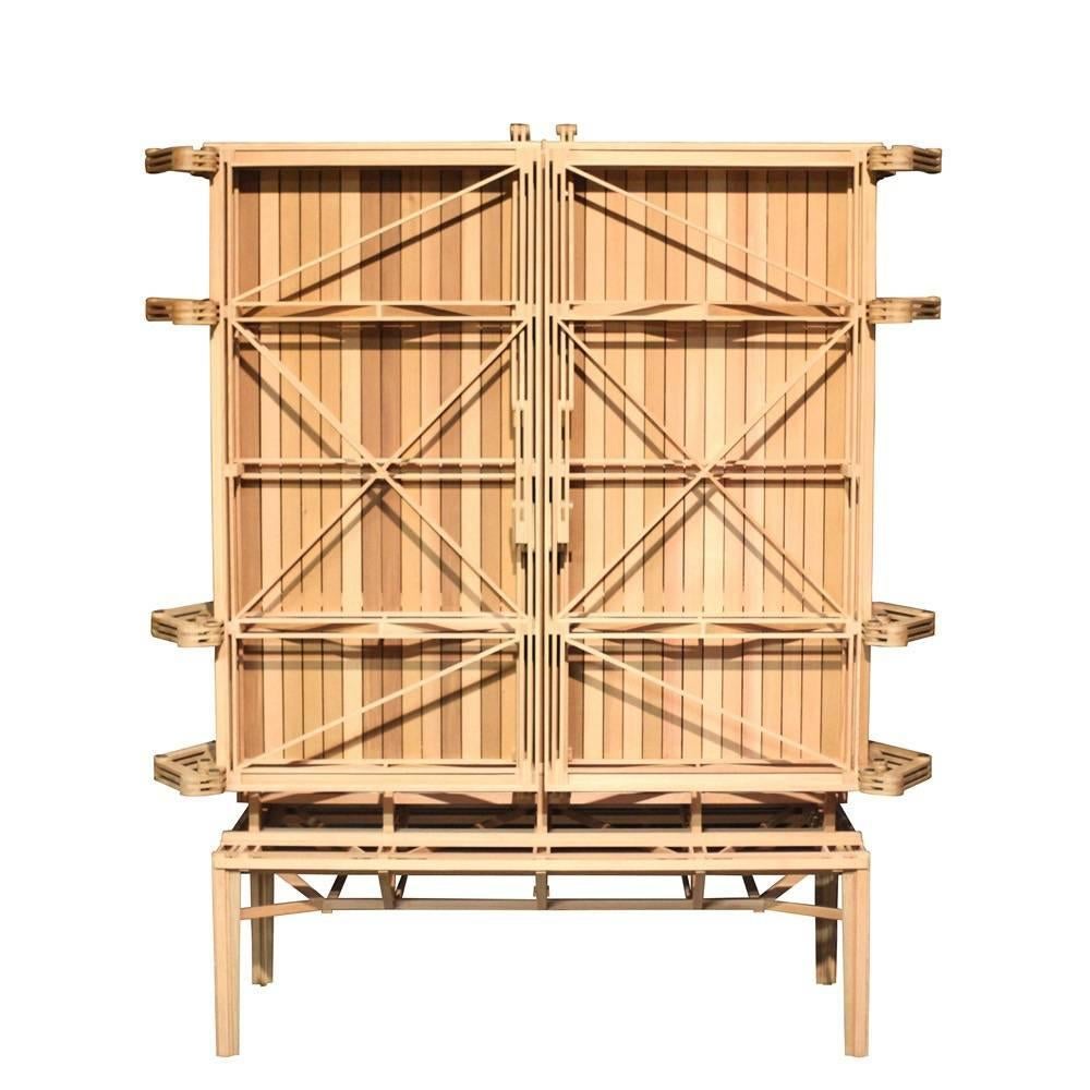 Paul Heijnen's construction cabinet overturns the traditional outside / inside dichotomy of a cabinet. This modular cabinet hides none of its inner workings. There is a door locking mechanism based on an old espagnolet lock and the hinges are built