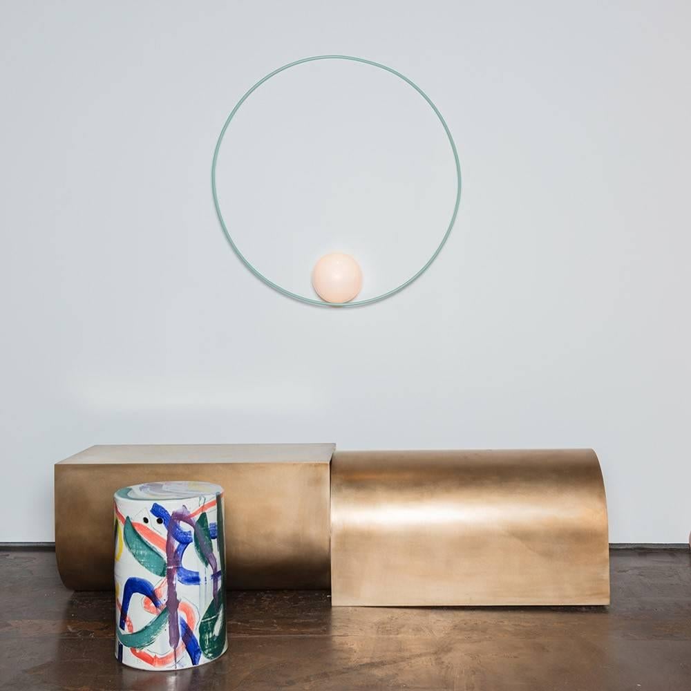 Michael Anastassiades’ Loop collection, created exclusively for The Future Perfect. Explores balance, color and minimal shapes. Thin green rings hold three orbital lights in the standout triple loop suspension. Working with the color and motif, the