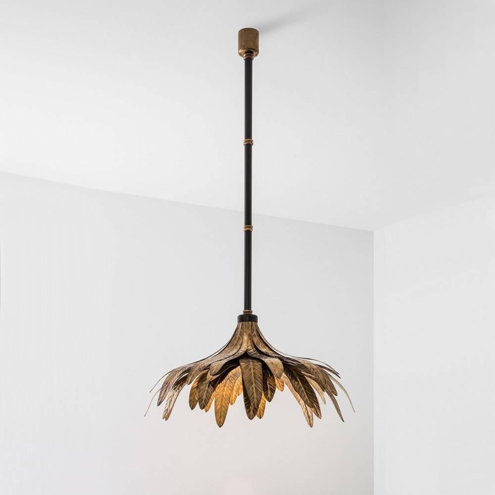 This 2015 designed ceiling lamp is in matte black painted metal and oxidized brass detailing. Handcrafted decorative leaves are in oxidized brass.

Dimorestudio’s Progetto Non Finito collection (unfinished in English) exemplifies the Milanese