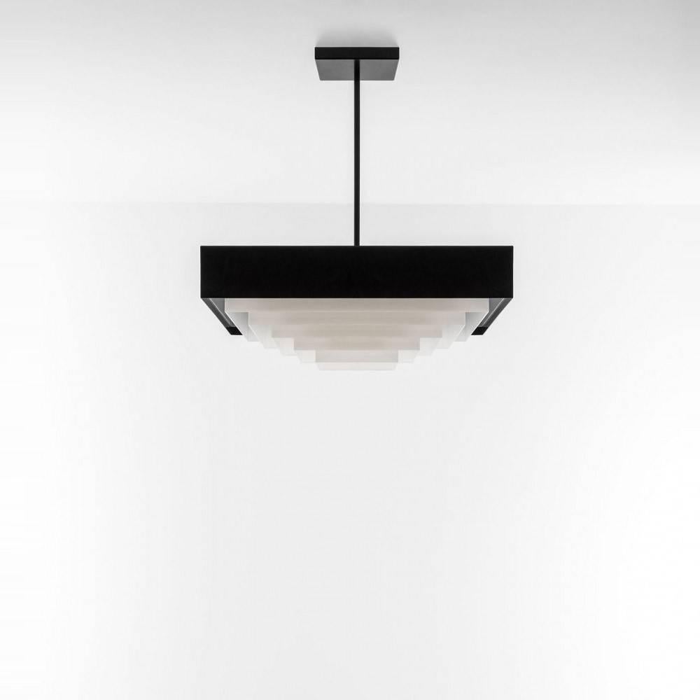 Lending a sense of brio to any room, this 2011 ceiling lamp comes in matte black painted metal and diffuser in opal perspex.

Dimorestudio’s Progetto Non Finito collection (unfinished in English) exemplifies the Milanese studio’s highly