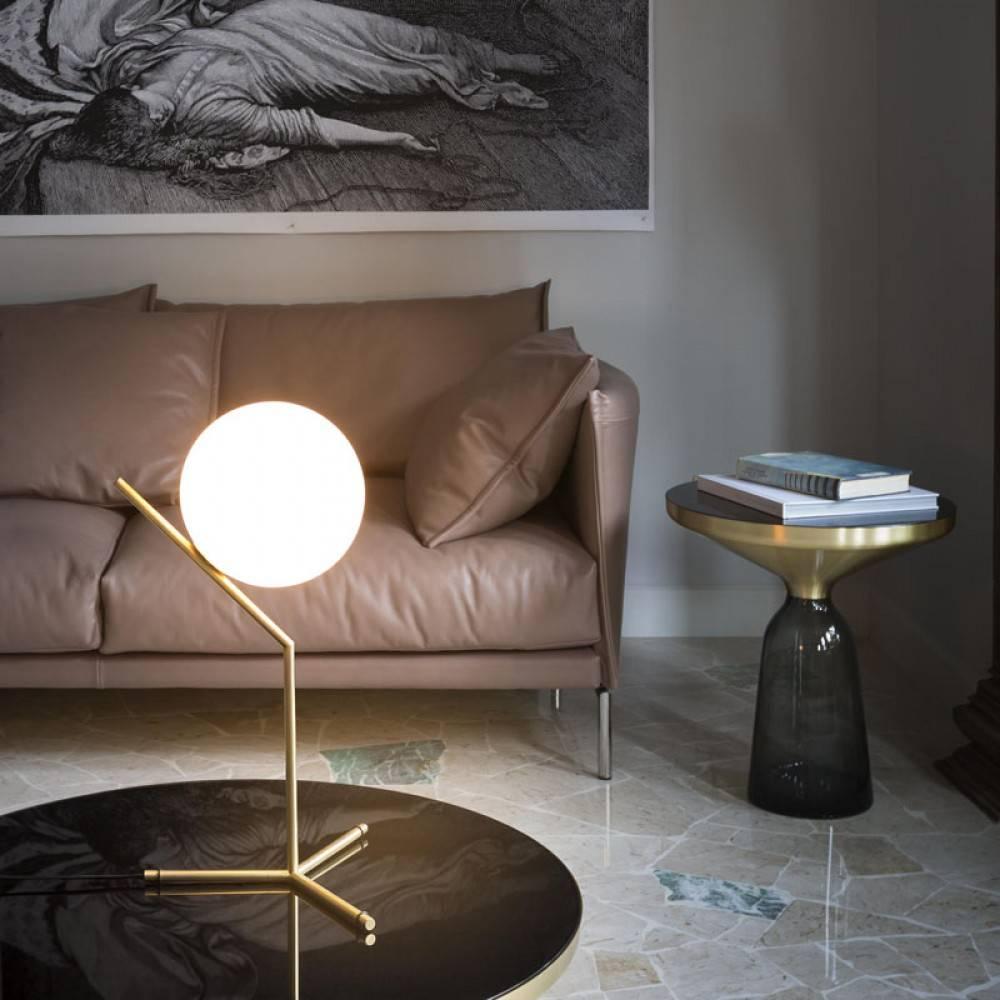 Michael Anastassiades's explores balance in his collection for Flos with a series of table lights, wall lights, ceiling pendants and ceiling mounted lights which take as their basic form a sphere that is perfectly balanced on the edge of a rod.
