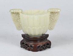 White Jade Cup With Carved Handles On A Wooden Base – China, Qing Dynasty, 18th