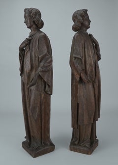 Pair of neo-Gothic statues in carved oak, 19th century