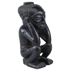 Seated Kuba figure - Democratic Republic of the Congo - first half of the 20th C
