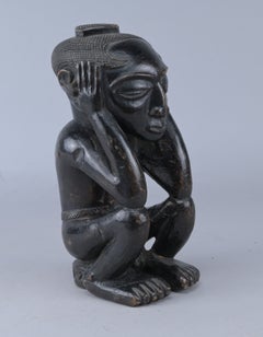 Seated Kuba figure - Democratic Republic of the Congo - first half of the 20th C