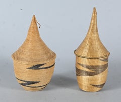 Two covered Tutsi agaseke from Rwanda - woven basketry, 1st half 20th century