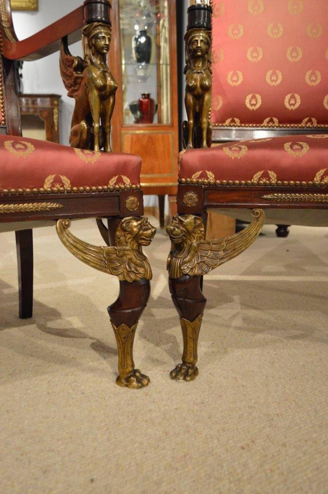 A fine pair of French Empire Revival mahogany & ormolu library chairs.  2