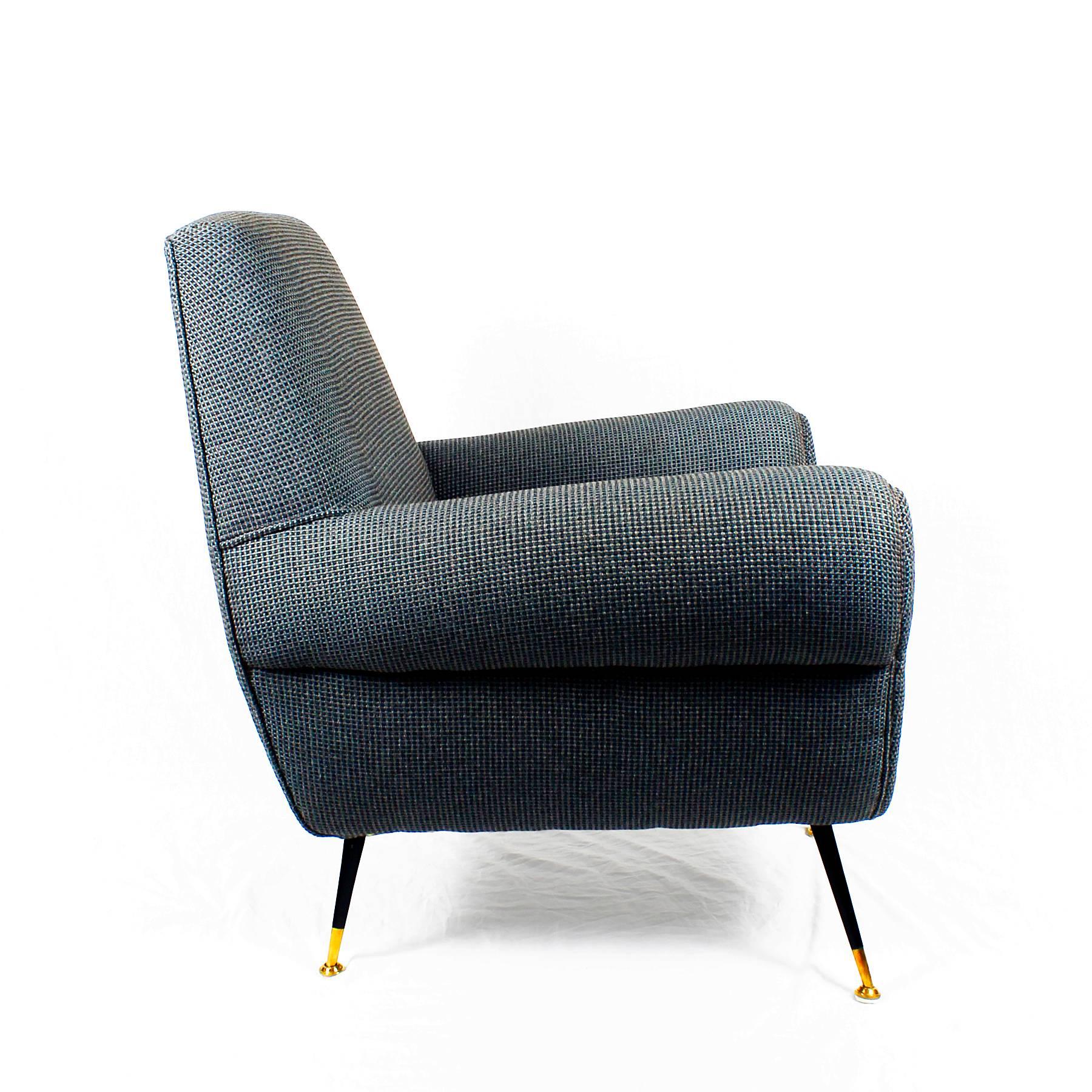 Armchair, black steel stands and polished brass feet. Restored and reupholstered with a black, brown and blue fabric.
Design: Gigi Radice
Maker: Minotti

Italy, circa 1960 

Measures: Smaller 87 x 75 x 88 cm seat 47 cm
Bigger 88 x 77 x 92 cm