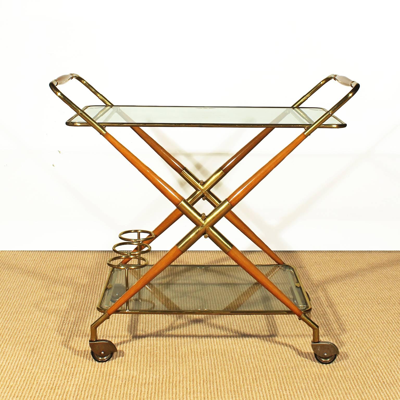 Foldable bar cart, solid beechwood, French polish, brass and glass two removable trays,

Italy, circa 1950.