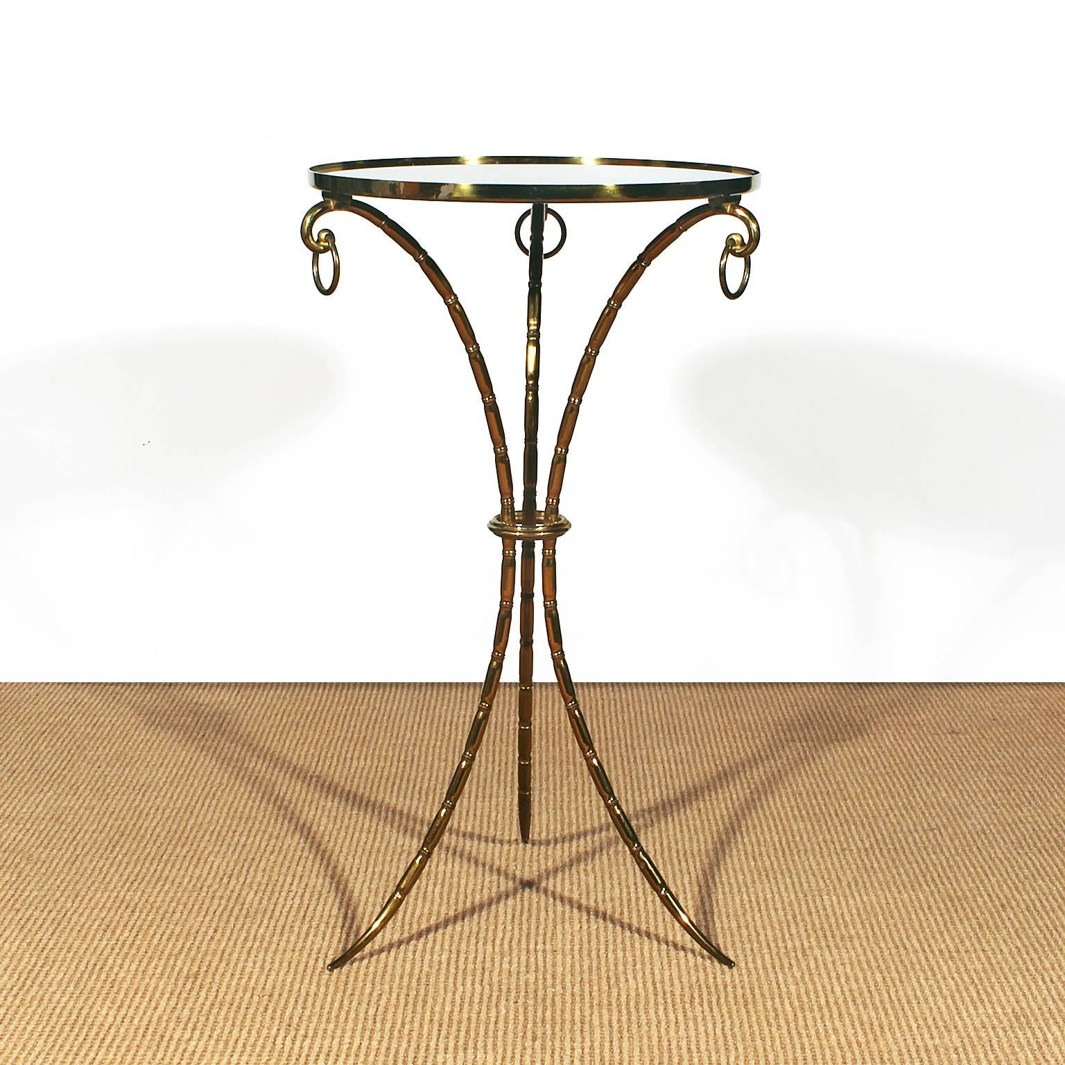 Small side table, false bamboo bronze structure, eglomised mirror on top.
Maison Baguès,
France, circa 1940.