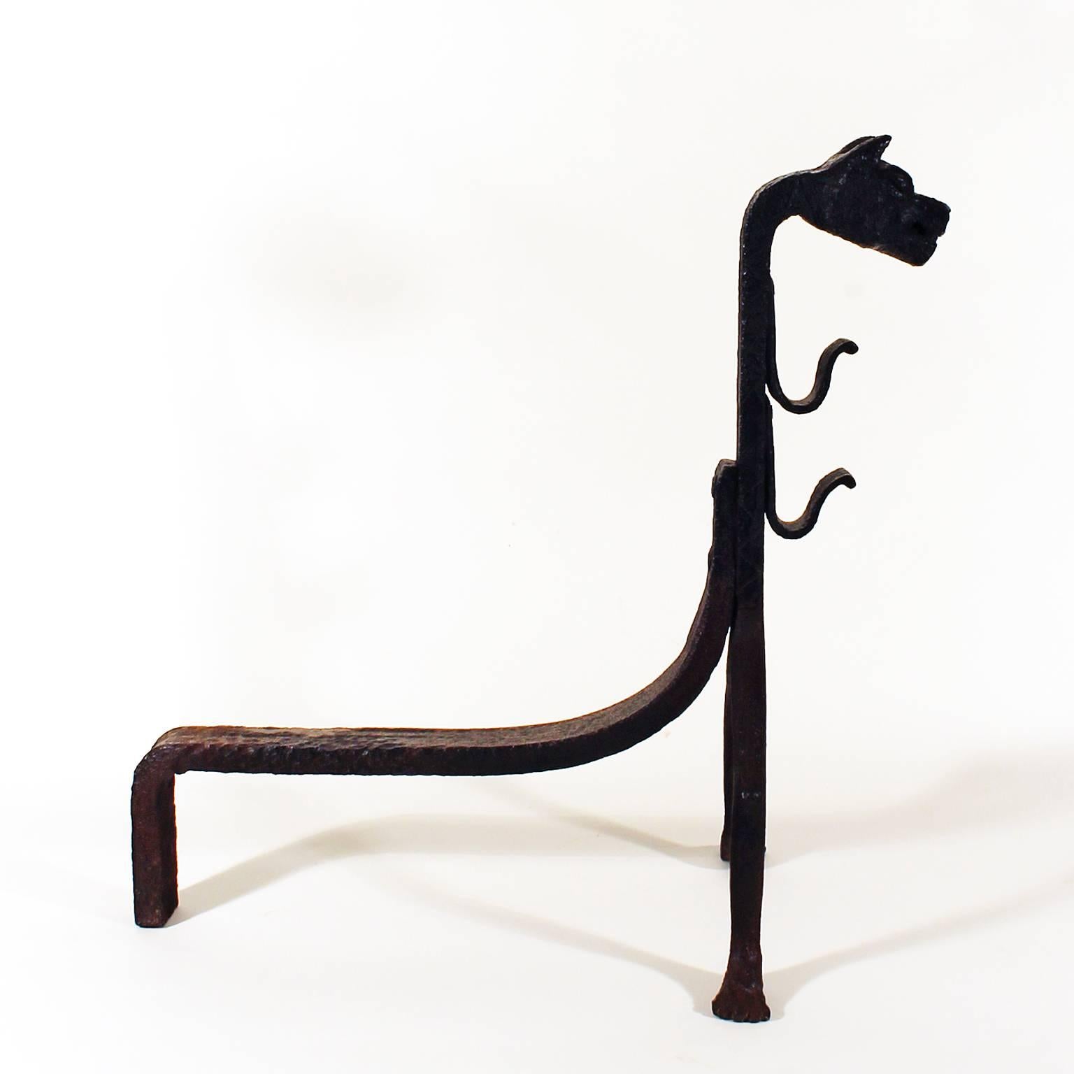 Catalan modernism pair of firedogs, completely realized in wrought iron in the 13th century style.
Design: Vicente Ibáñez Cotanda (signed).
Spain, Catalonia 1910-1920.

Vicente Ibáñez Cotanda was an important master blacksmith that worked