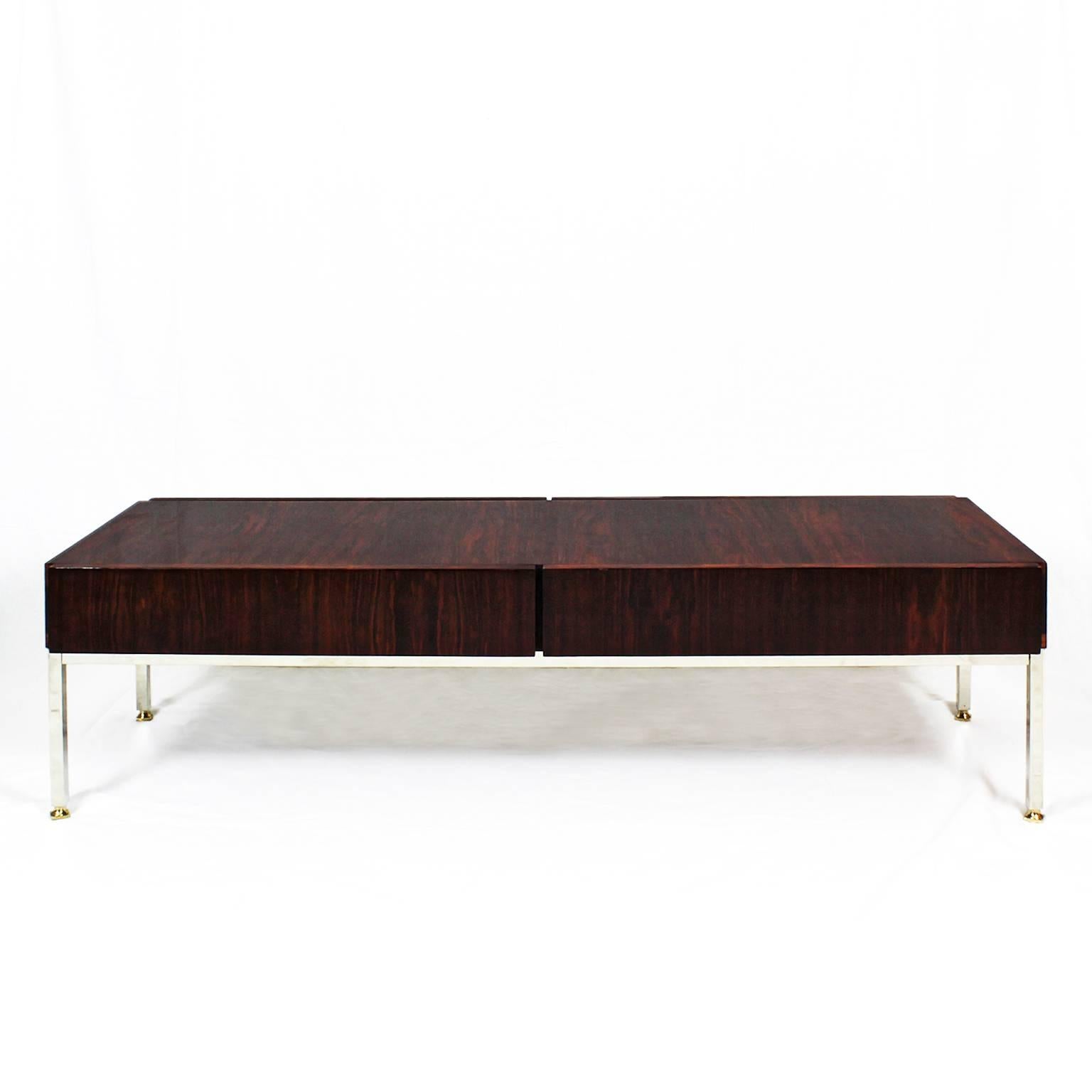 Coffee table with two drawers on one side, mahogany veneer, French polish, nickel-plated metal feet.
Designer: Luigi Bartolini - Paris (label),
France, circa 1960.