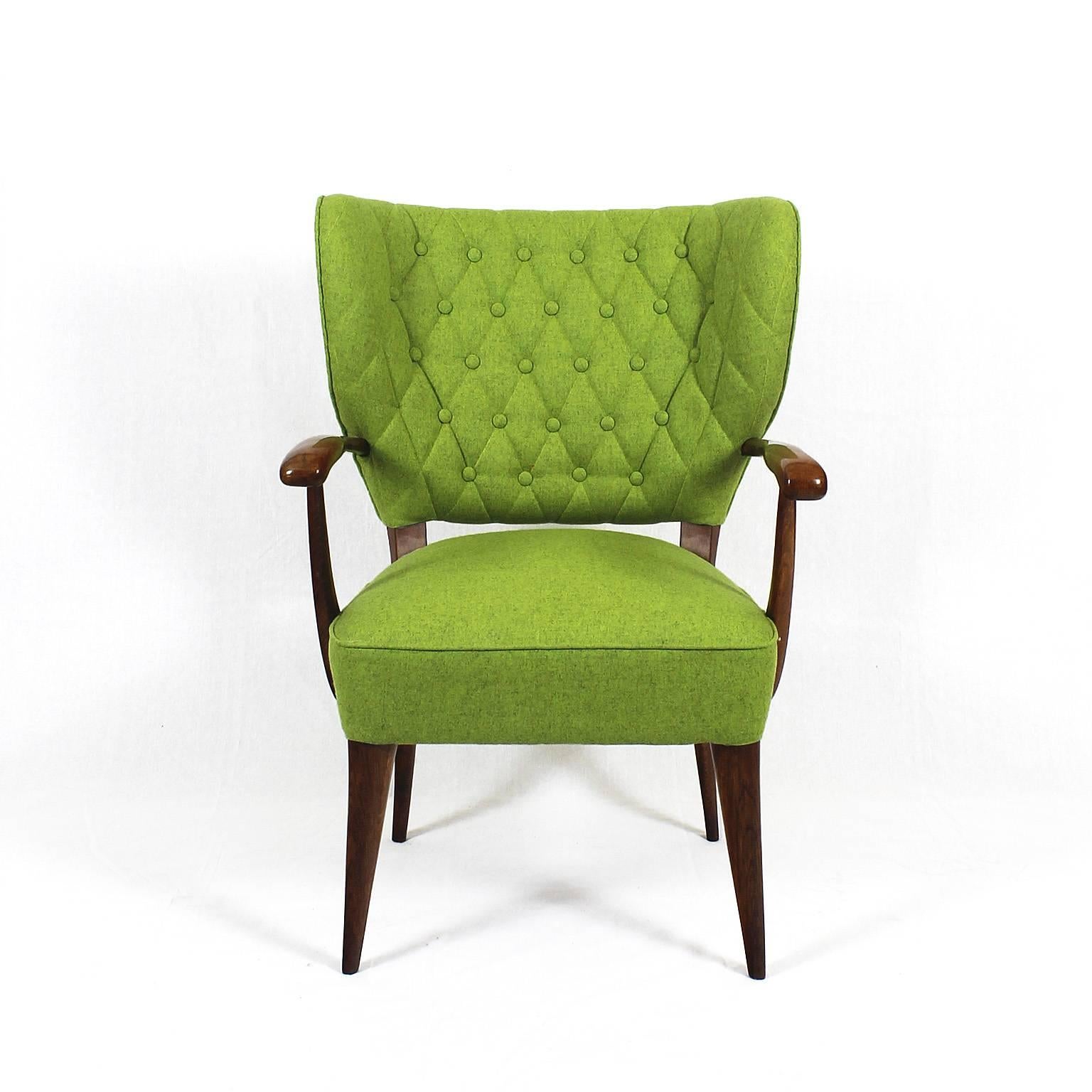 Pair of small armchairs, oakwood, French polish, new upholstery and tufted back in anise green wool,

France, circa 1940.