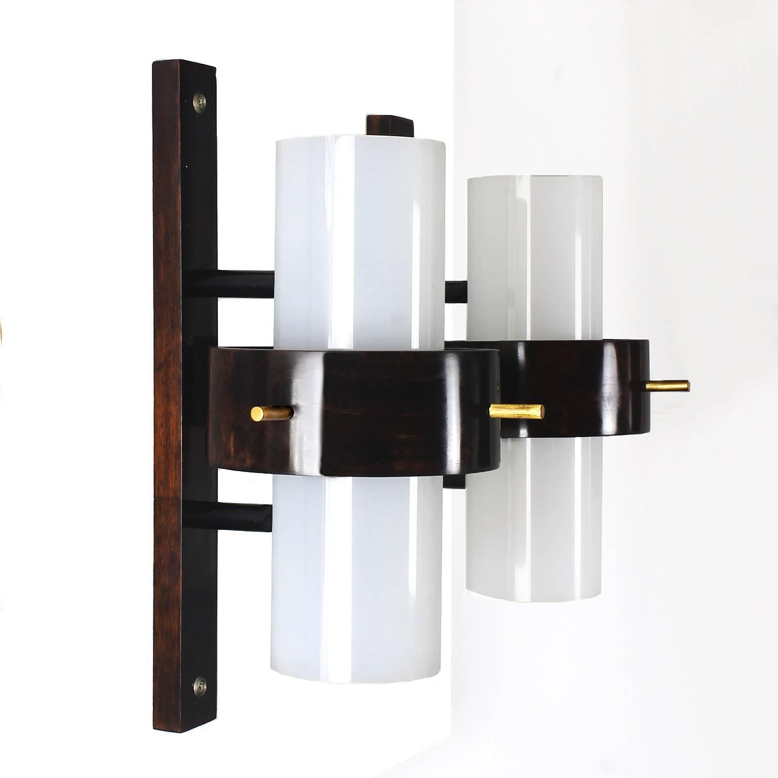Rare set of four wall lights in exotic solid wood, french polish, plexiglass and polished brass,

France, circa 1960.