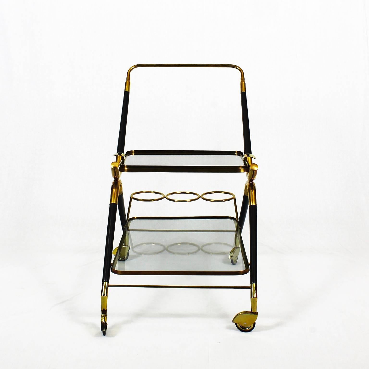 Small bar cart, french polished and stained solid mahogany, polished brass and glass, removable tray.

Design: Cesare Lacca

Italy c. 1950