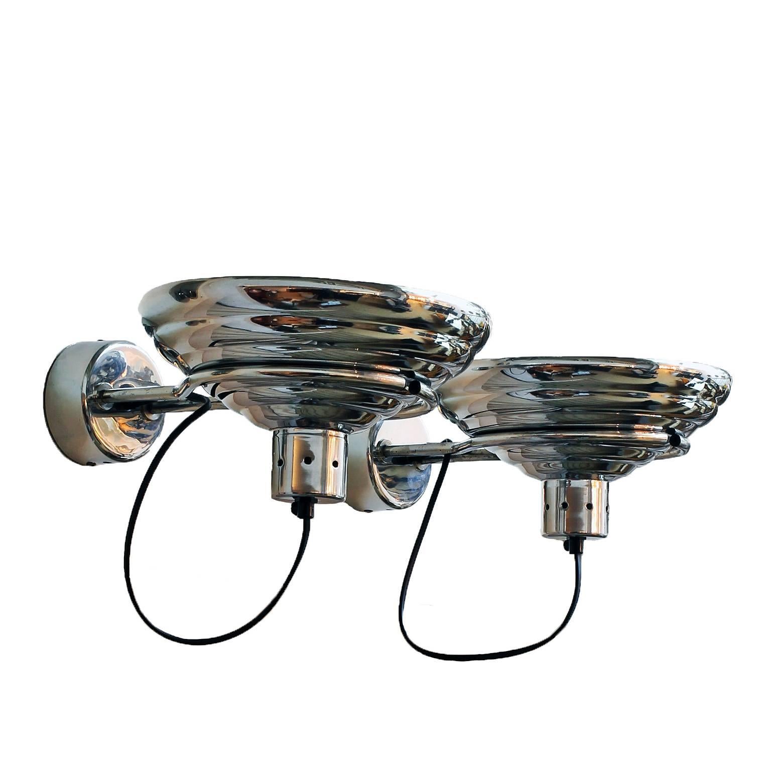 Pair of Industrial wall lights, polished aluminium.

Italy, circa 1960.