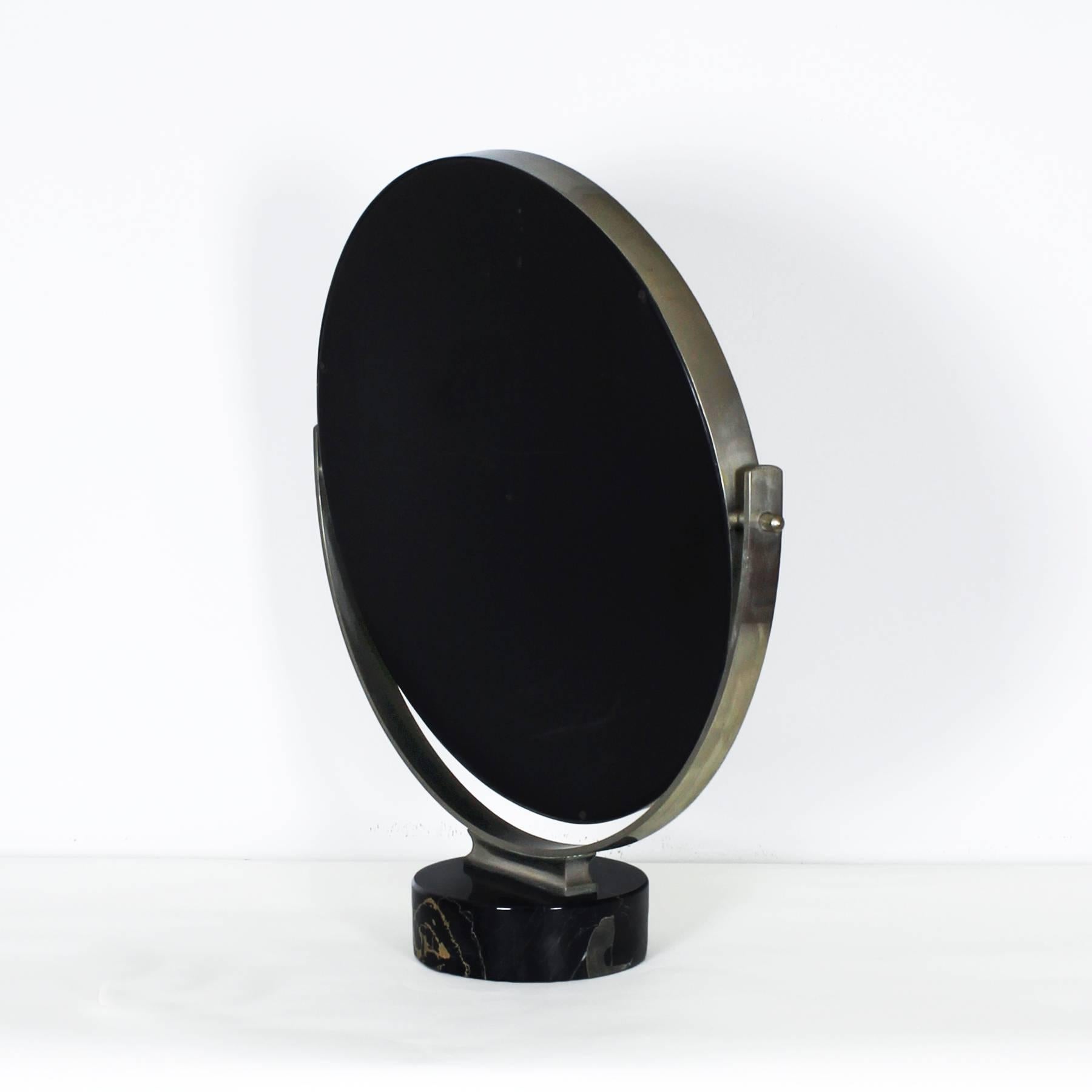 Pivoting vanity-table mirror, brushed nickel-plated frame and portor marble base. Original patina.

Design: Sergio Mazza

Italy, late 1960s.