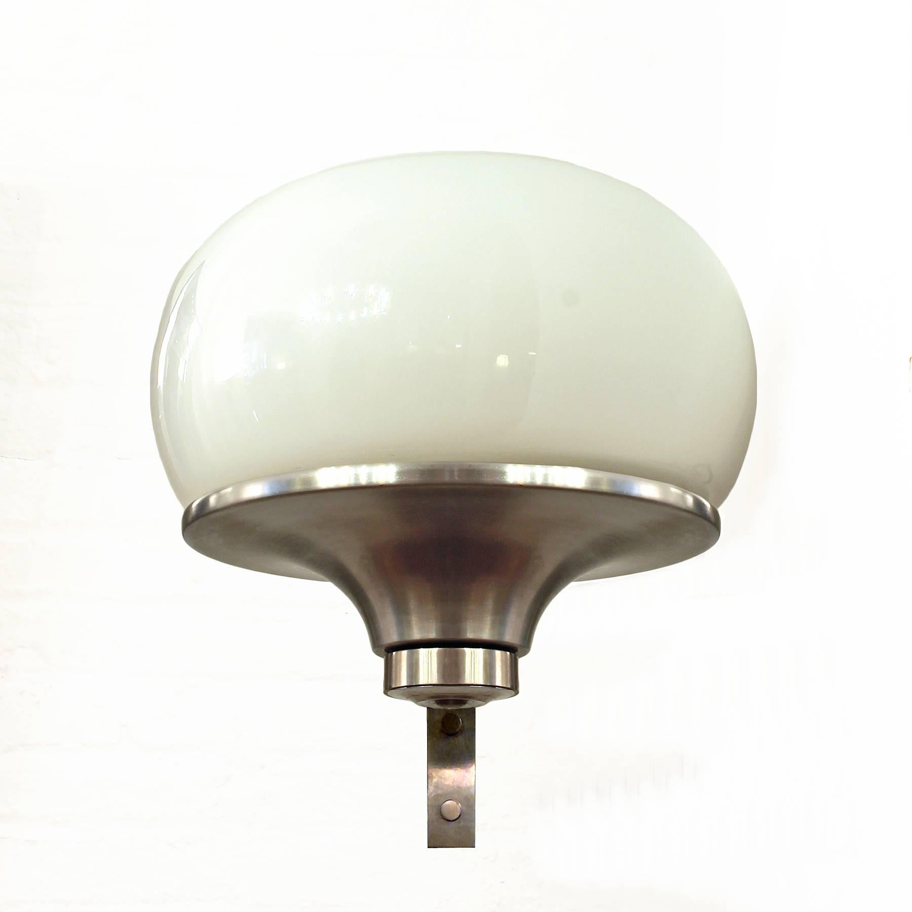 Pair of large rounded wall lights, nickel-plated brass and white opaline.

Italy, circa 1960.