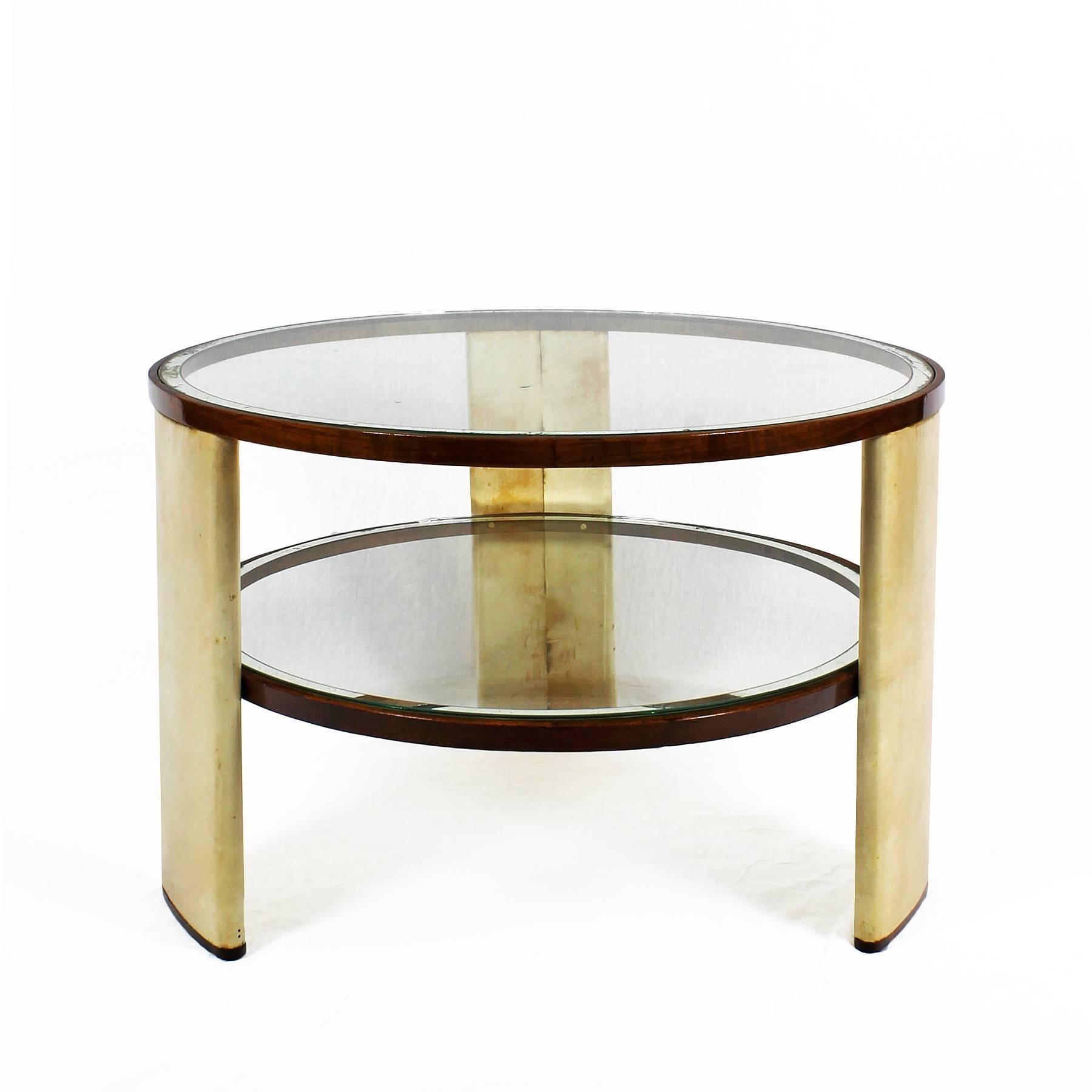 Rare Art Deco side table with three parchment covered wood stands with walnut bases. Two glass trays with mirror strips, one inserted at mid height and the other one on top of stands, French polish,

Italy, circa 1930

The table is in good