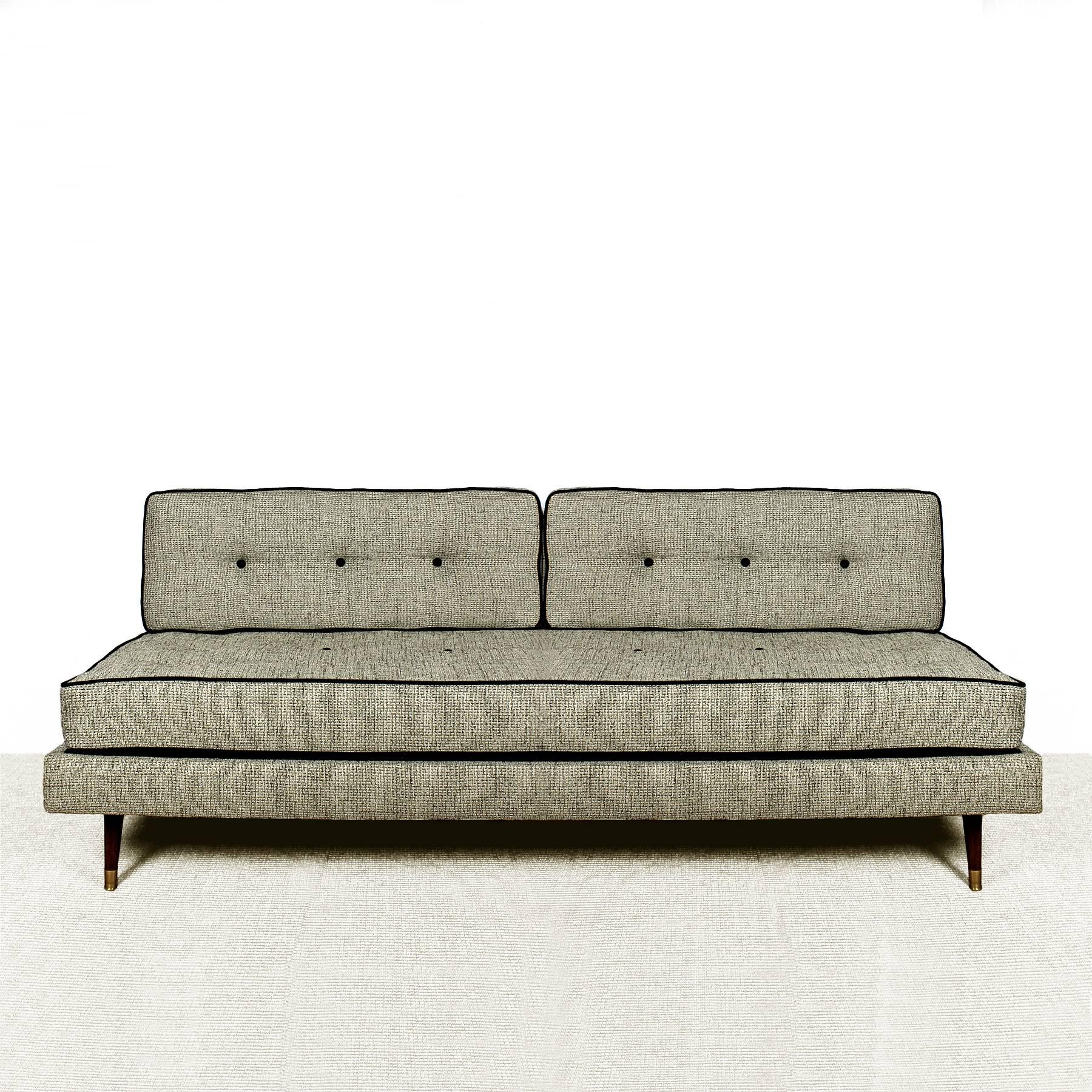 Big "banquette", wood structure with four mahogany stands with polished brass feet, sprung bed base, big mattress and two cushions, all three with springs. The back is reinforced by a black steel structure. New upholstery, 

France,