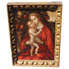 Madonna fiamminga del XVI secolo in un roseto