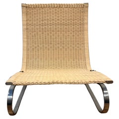 Sedia lounge in vimini Fritz Hansen PK 20 disegnata da Poul Kjærholm