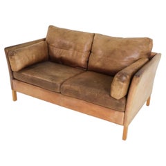 Canapé deux places de style scandinave danois moderne du milieu du siècle, en cuir beige patiné