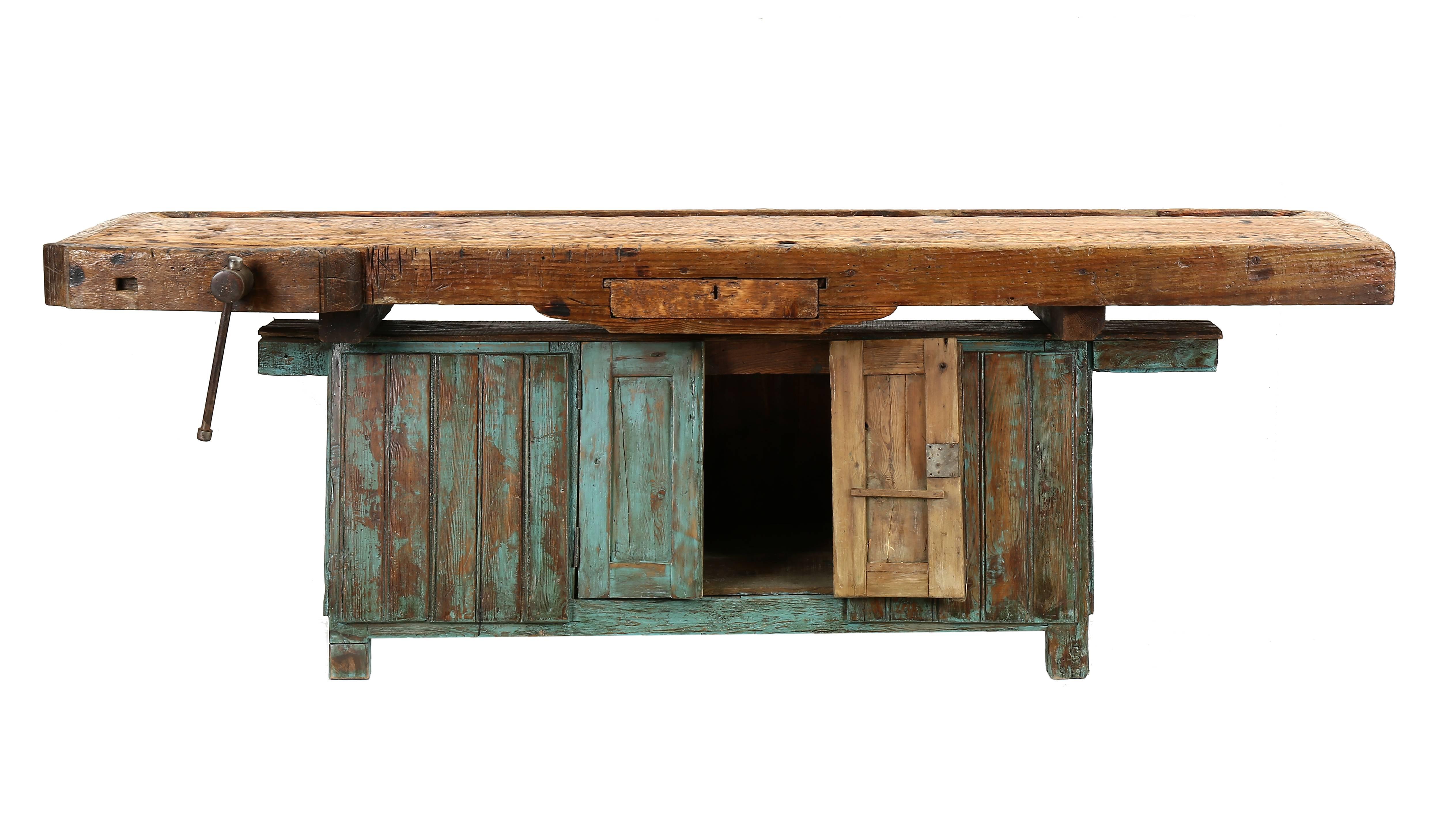 Portuguese carpenter's bench in wood, with iron application.
Composed of two original pieces, the top with one drawer and storage.