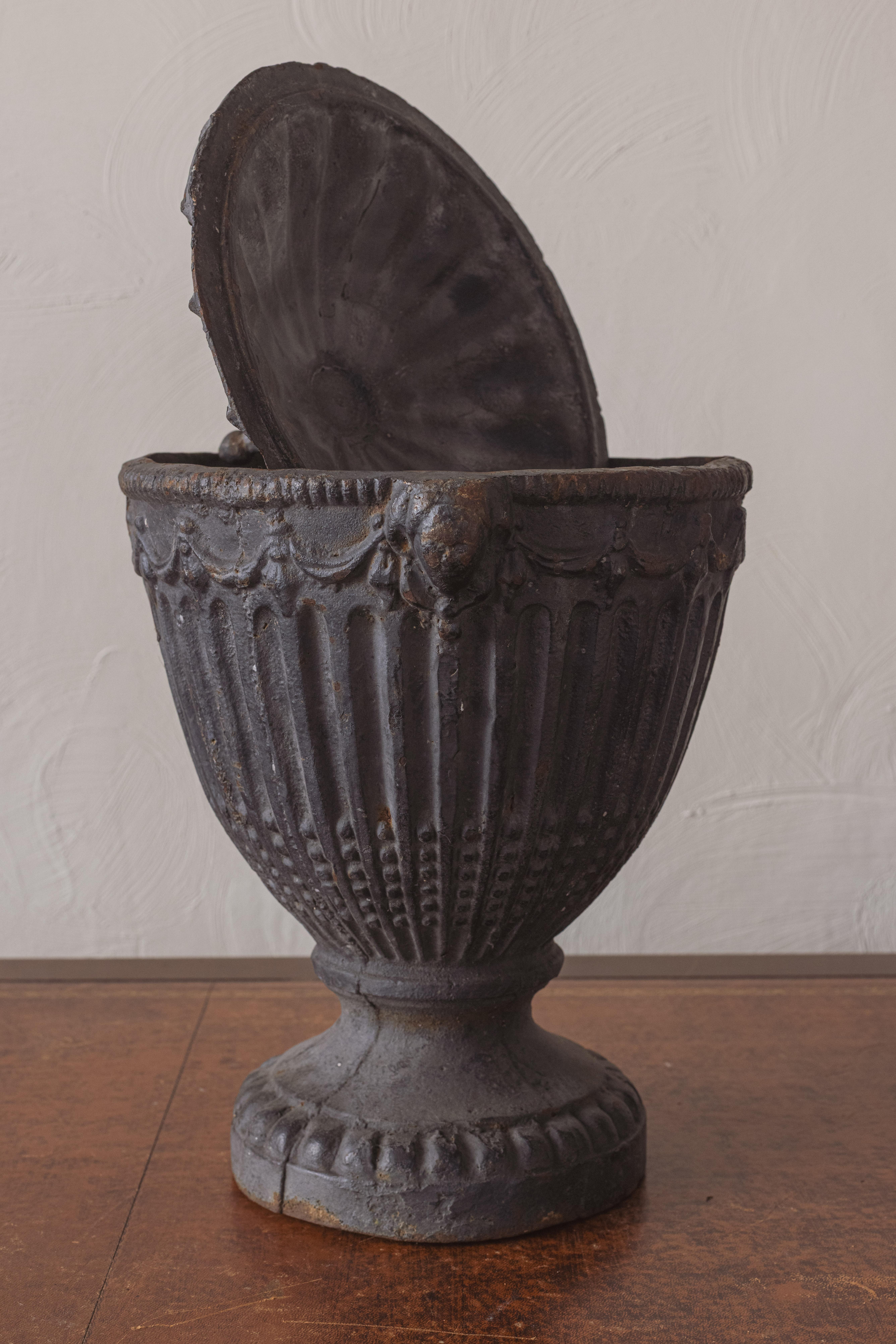 Neoclassical A Pair of Cast Iron Urns For Sale