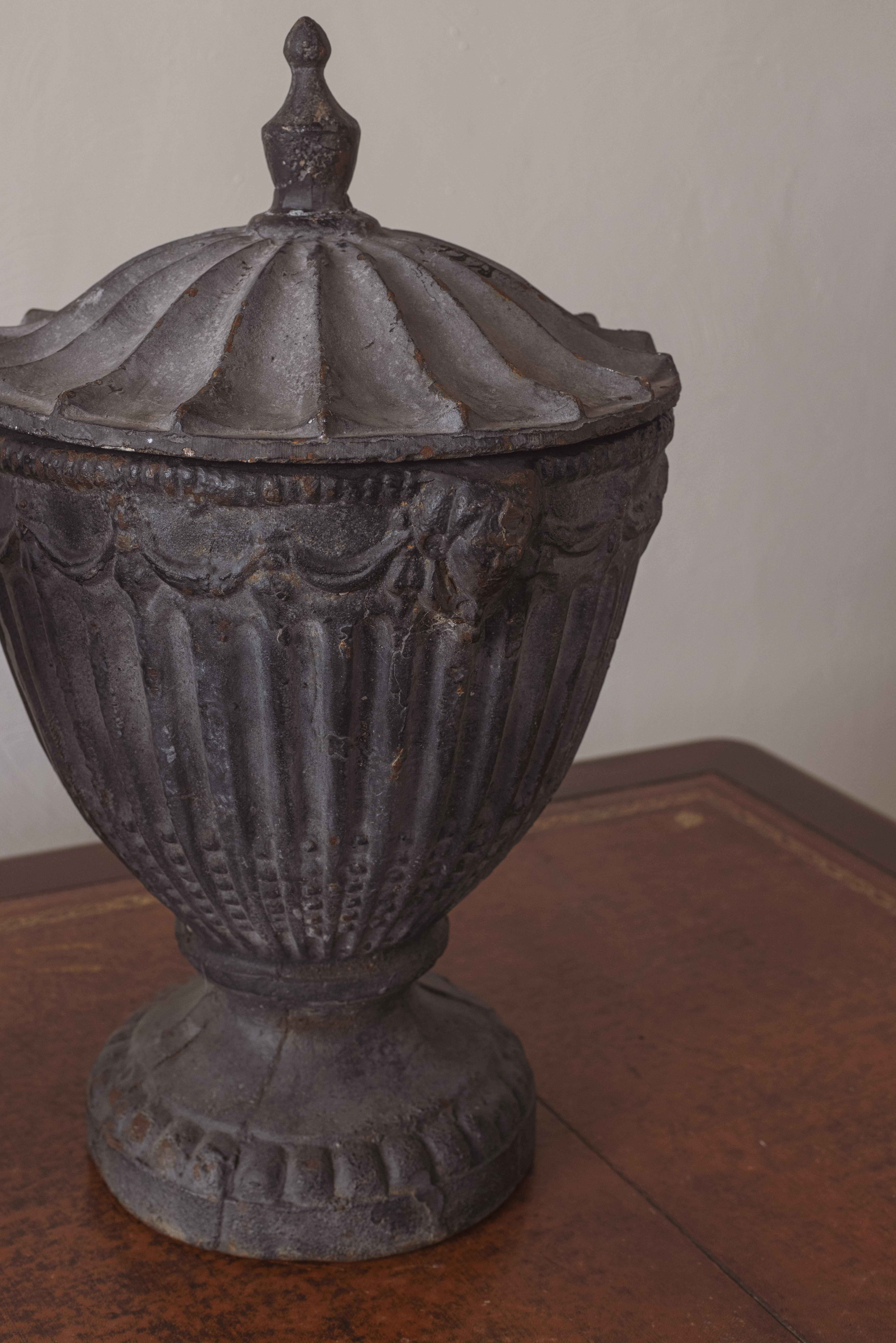 English A Pair of Cast Iron Urns For Sale