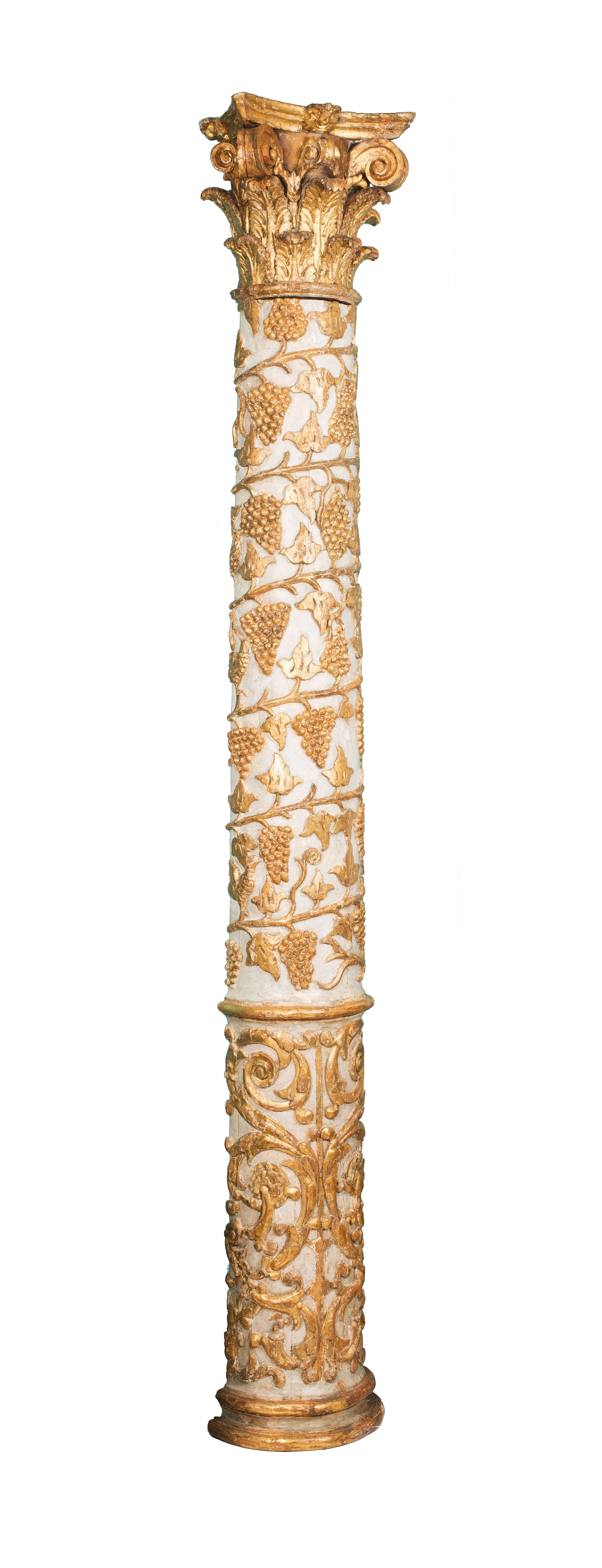 For sale on 1stdibs a pair of 18th century Italian carved, gilded and cream painted wood half columns. Decorated with foliage, grapes and birds these Baroque pieces are an important pair to side some piece or door in a house. The lower part
