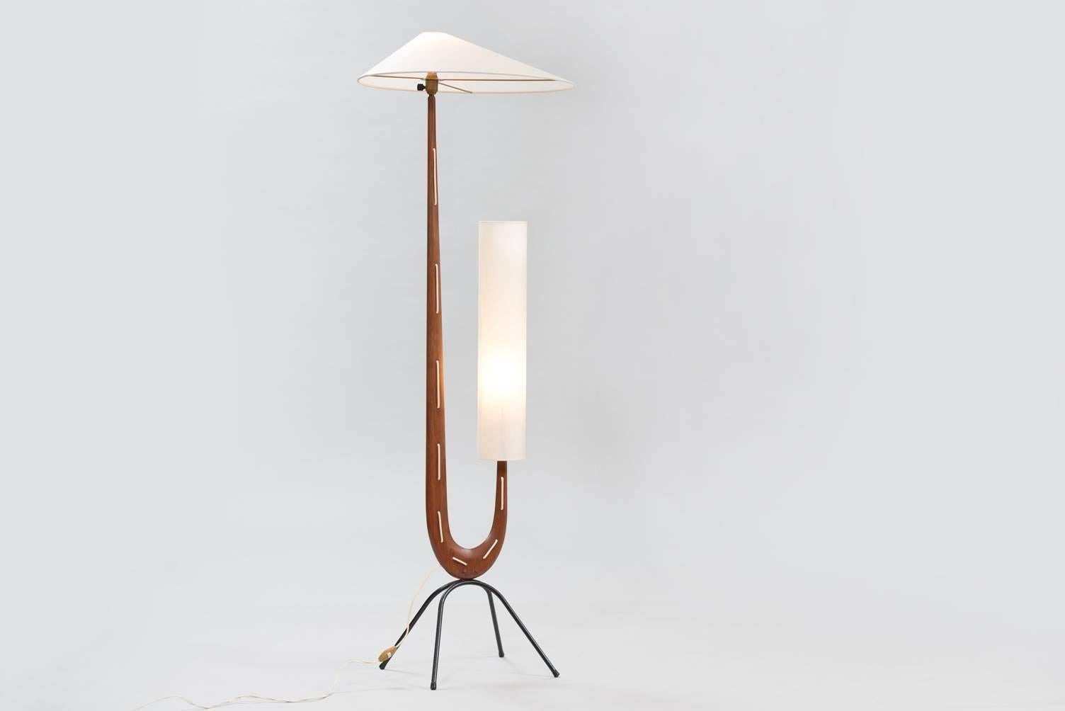 Floor lamp with mahogany and lacquered metal base with two new parchment paper shades.
This lamp was influenced by the work of Hans Arp.