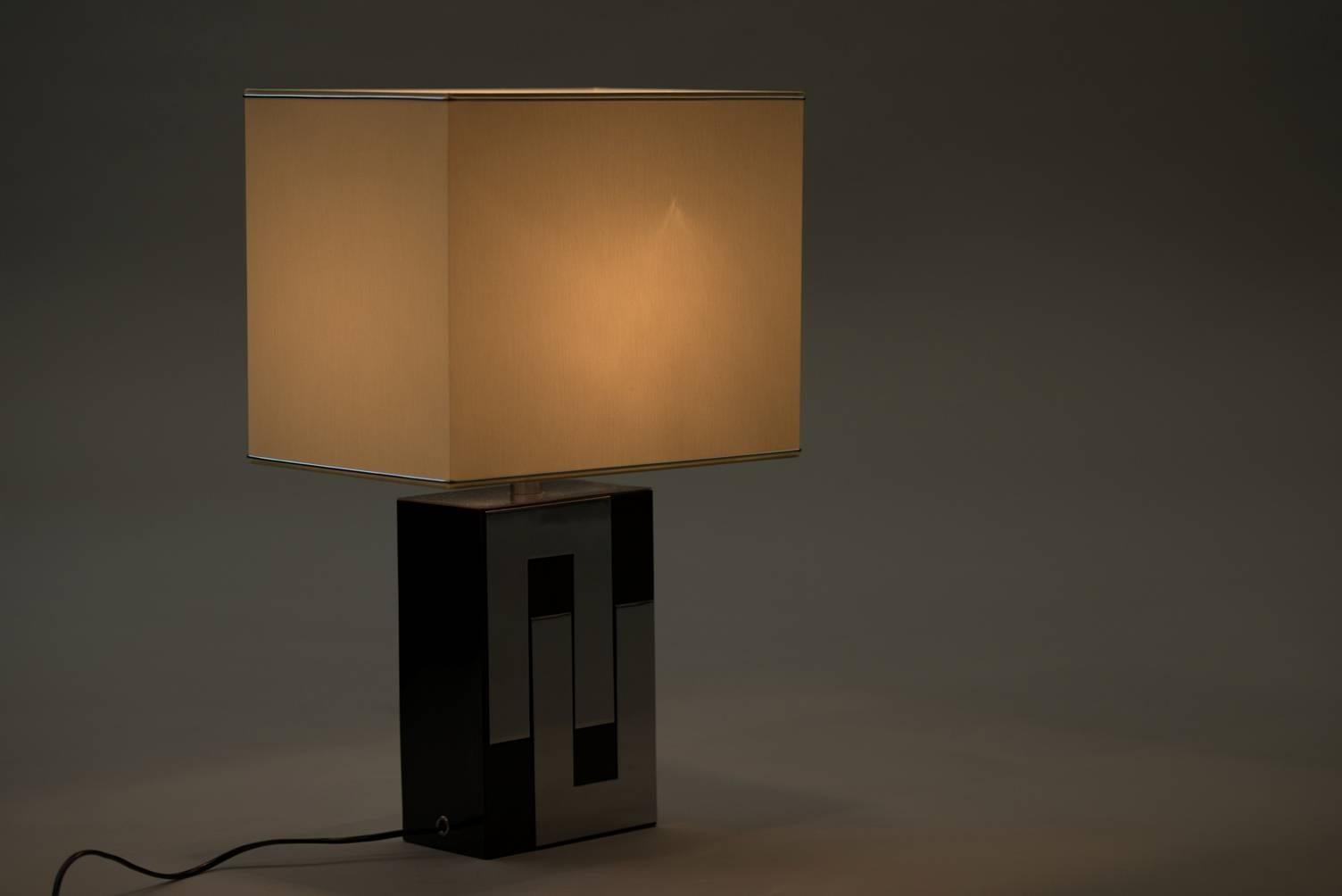 Black formica and chrome table lamp.