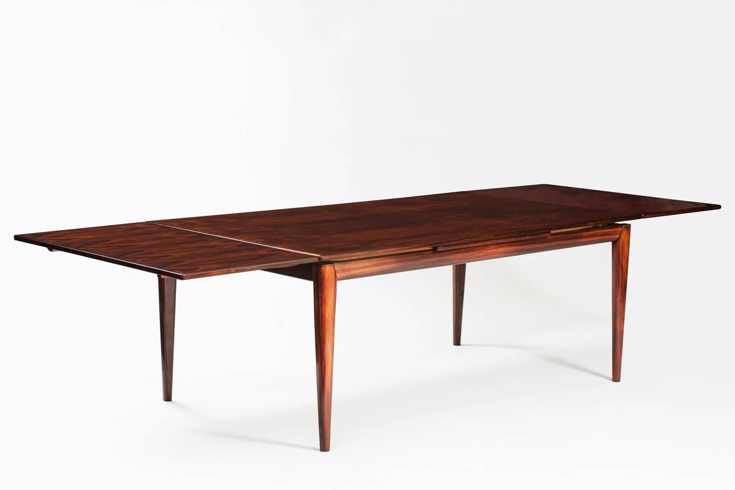 Rosewood large extendable dining table.
Measures: W 180 296 cm (open).
Producer: J.L. Møller.