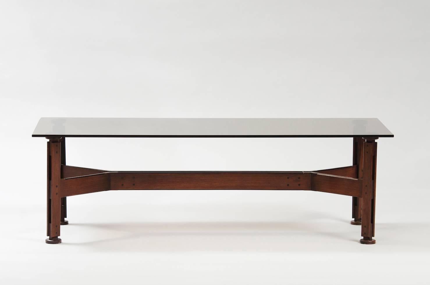 Rosewood and smoked glass top coffee table.