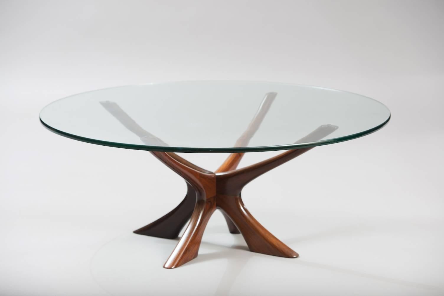 Massive rosewood Spider coffee table with a thick glass top.
Producer: Søren Willadsen.