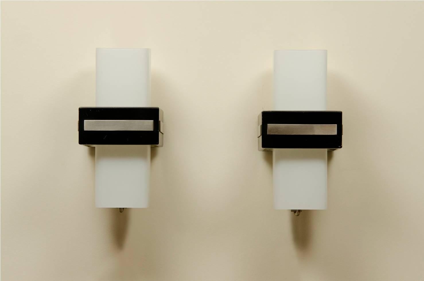 Pair of wall sconces, aluminium and frosted glass.